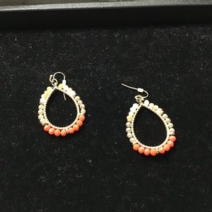 Earrings neon orange into gold tone setting with white khaki tone beads
